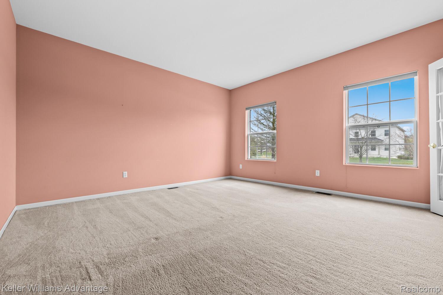 4100 Norwich Court Rochester, MI 48306 - Photo 5 of 72 Unfurnished room featuring light colored carpet and baseboards