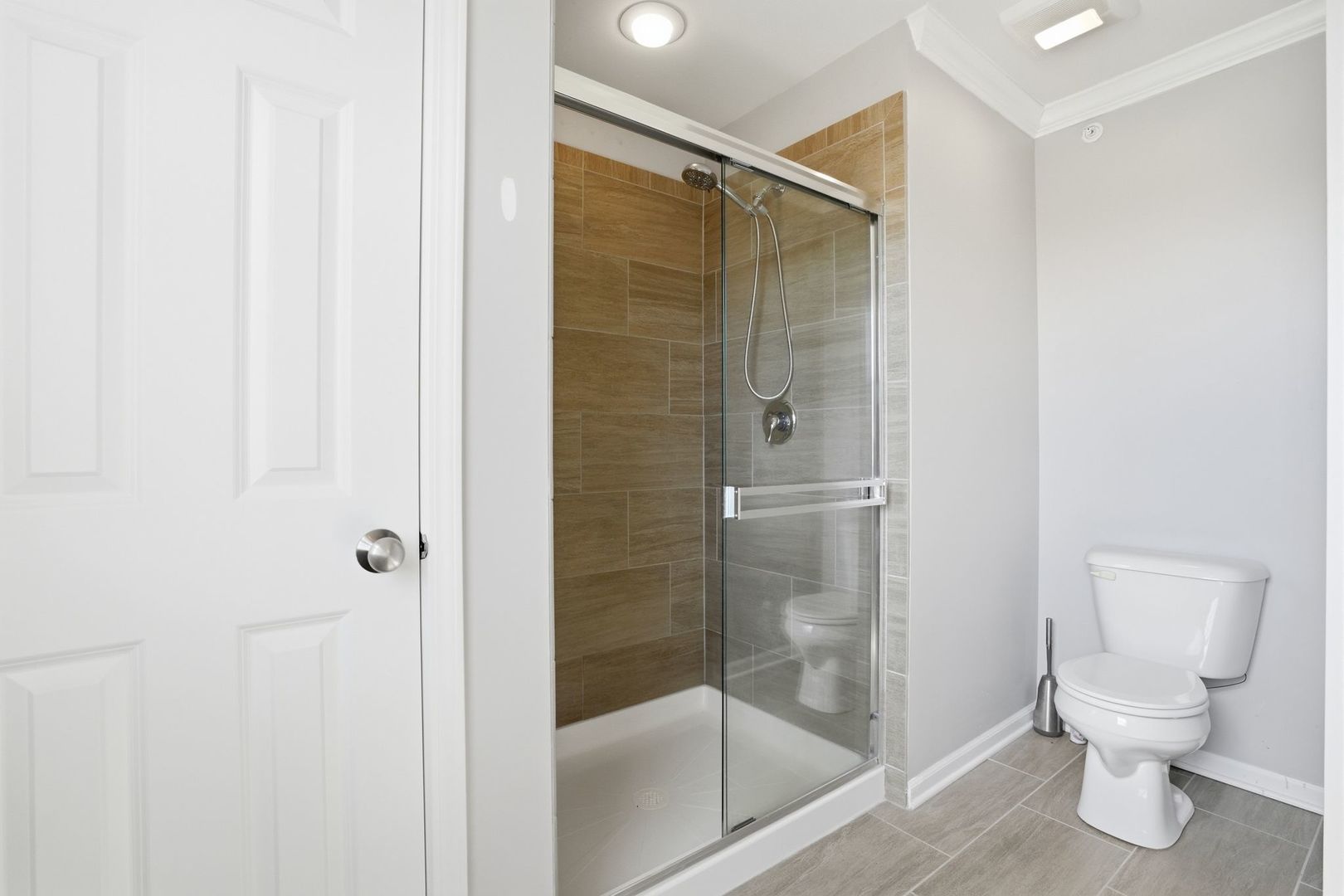 2925 Madison Drive Naperville, IL 60564 - Photo 18 of 37 a bathroom that has a toilet and a shower