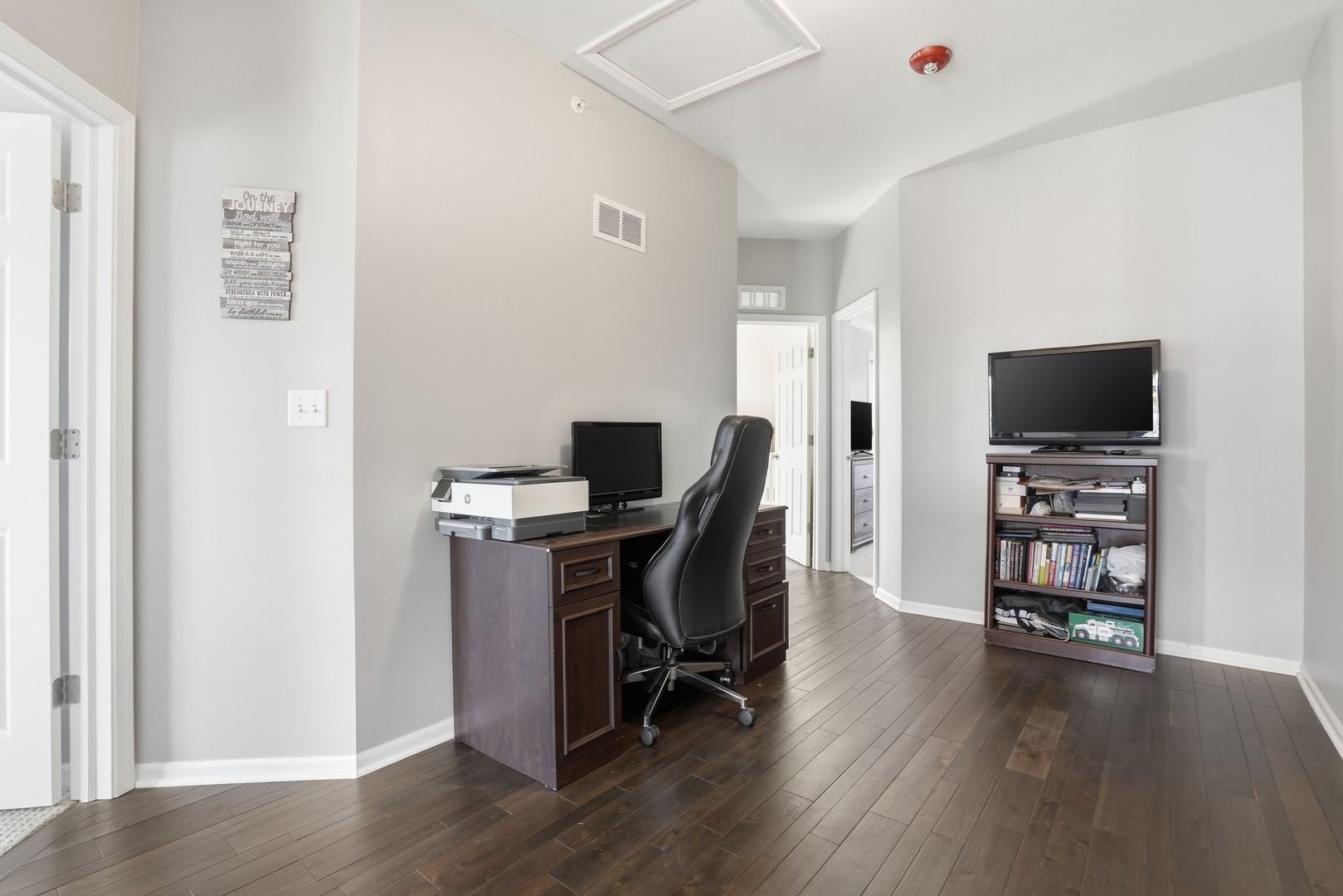 2925 Madison Drive Naperville, IL 60564 - Photo 19 of 37 a view of a workspace with furniture and wooden floor
