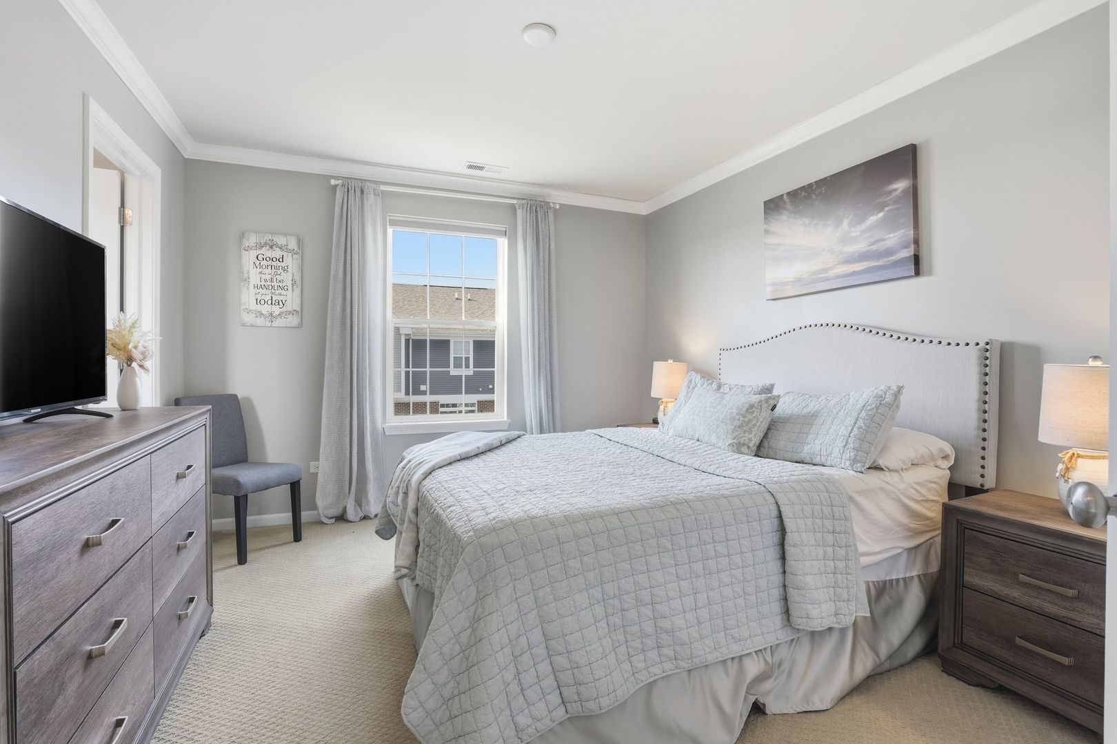 2925 Madison Drive Naperville, IL 60564 - Photo 22 of 37 a bedroom with a bed and a flat screen tv