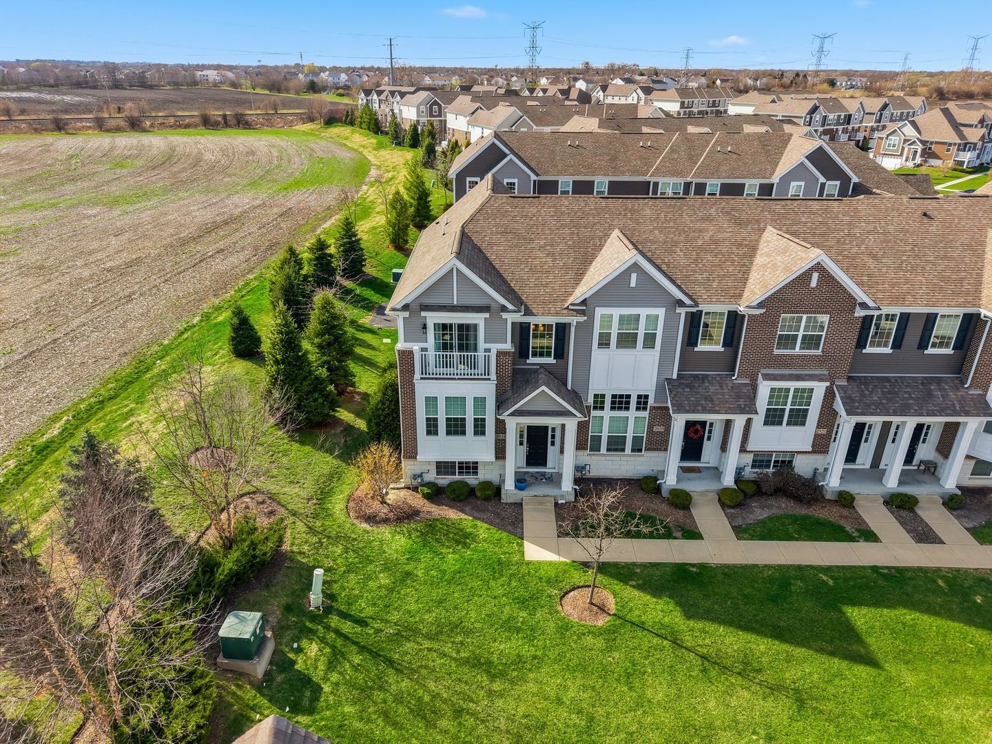 2925 Madison Drive Naperville, IL 60564 - Photo 34 of 37 a aerial view of a house with a garden and lake view