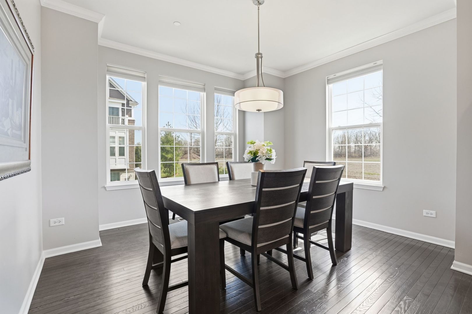 2925 Madison Drive Naperville, IL 60564 - Photo 8 of 37 a view of a dining room with furniture window and wooden floor