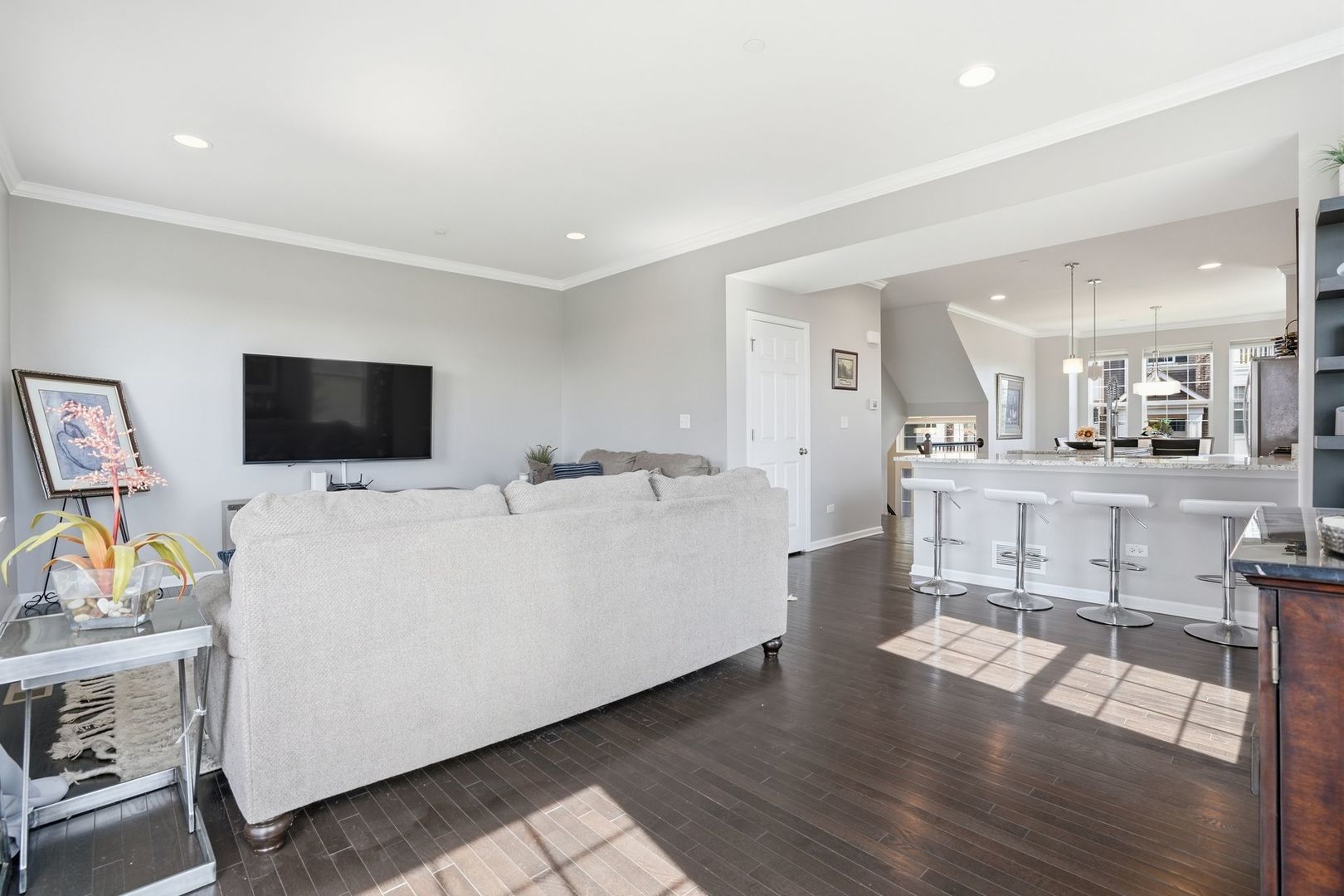 2925 Madison Drive Naperville, IL 60564 - Photo 10 of 37 a living room with furniture and a flat screen tv
