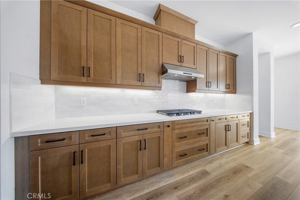 28632 Old Spgs Road Castaic, CA 91384 - Photo 16 of 70 a kitchen with granite countertop cabinets stainless steel appliances and sink