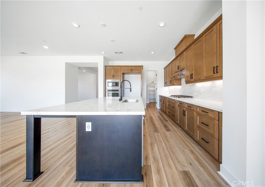 28632 Old Spgs Road Castaic, CA 91384 - Photo 20 of 70 a spacious bathroom with a double vanity sink and a mirror