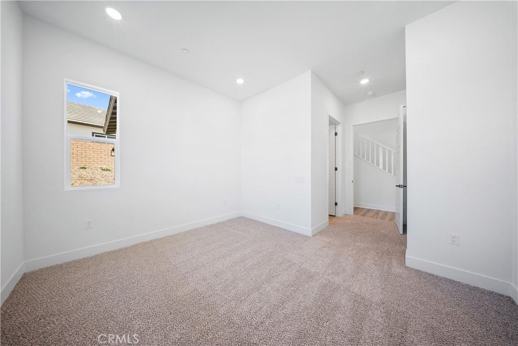 28632 Old Spgs Road Castaic, CA 91384 - Photo 31 of 70 an empty room with windows and entrance