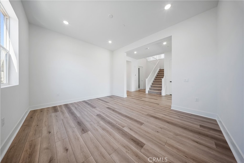 28632 Old Spgs Road Castaic, CA 91384 - Photo 32 of 70 a view of a room with wooden floor and window
