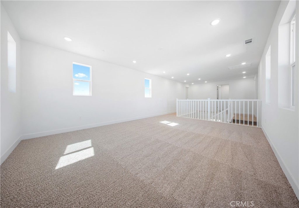 28632 Old Spgs Road Castaic, CA 91384 - Photo 38 of 70 an empty room with a projector and entrance