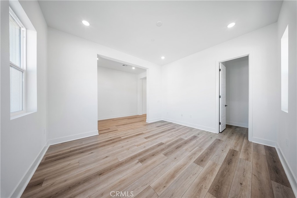 28632 Old Spgs Road Castaic, CA 91384 - Photo 40 of 70 wooden floor in an empty room with a window