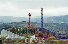 28632 Old Spgs Road Castaic, CA 91384 - Photo 69 of 70 a front view of a house with a garden and mountain in the background