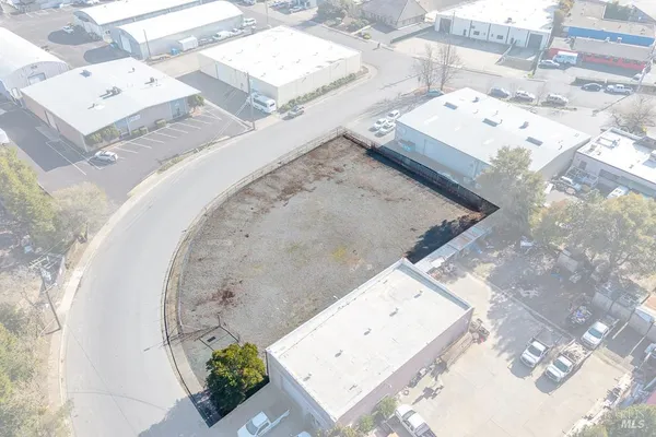 an aerial view of a house with outdoor space