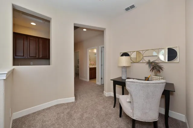 a view of kitchen and dining room with wooden floor