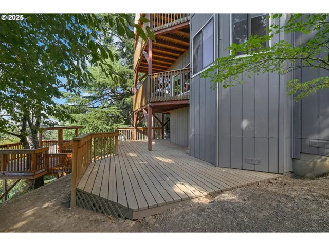 a view of outdoor space with wooden floor