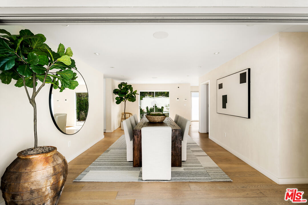 1600 North Kings Road Los Angeles, CA 90069 - Photo 12 of 37 a living room with furniture and a potted plant