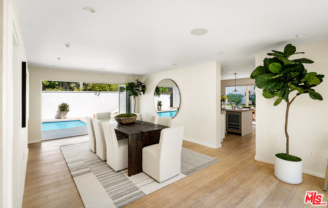 1600 North Kings Road Los Angeles, CA 90069 - Photo 10 of 37 a living room with furniture and a potted plant