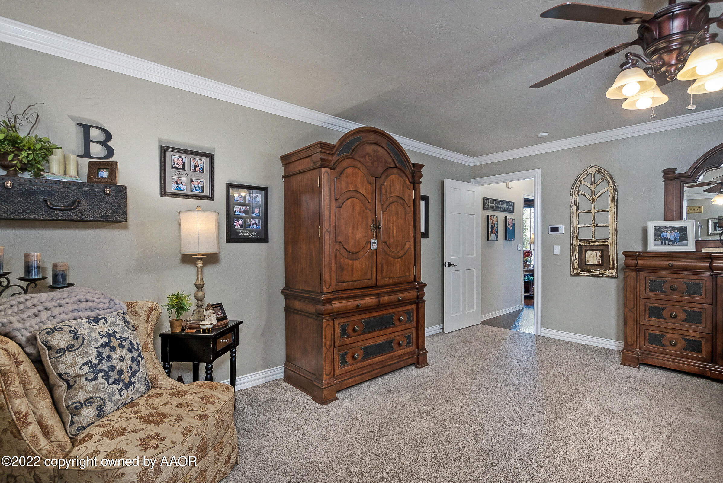 4223 Langtry Drive Amarillo, TX 79109 - Photo 13 of 56 a bedroom with a bed and furniture