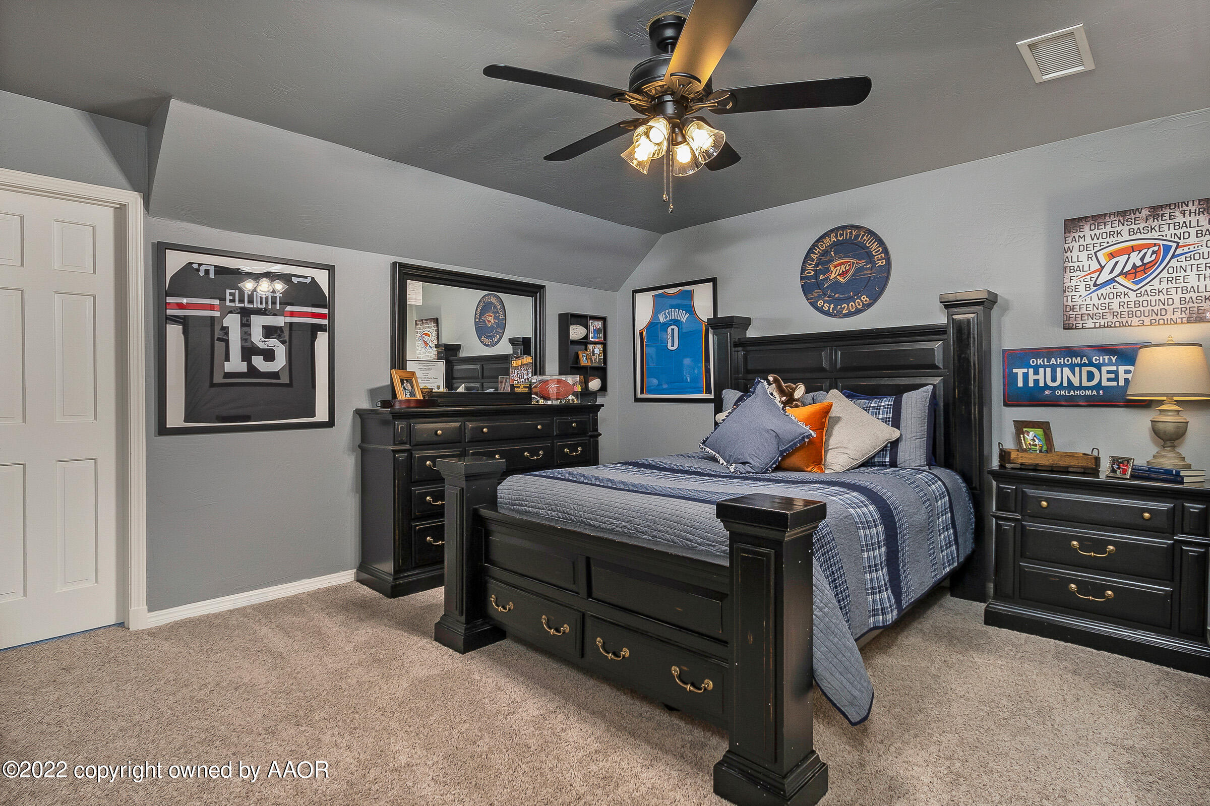 4223 Langtry Drive Amarillo, TX 79109 - Photo 42 of 56 a bedroom with a bed and furniture