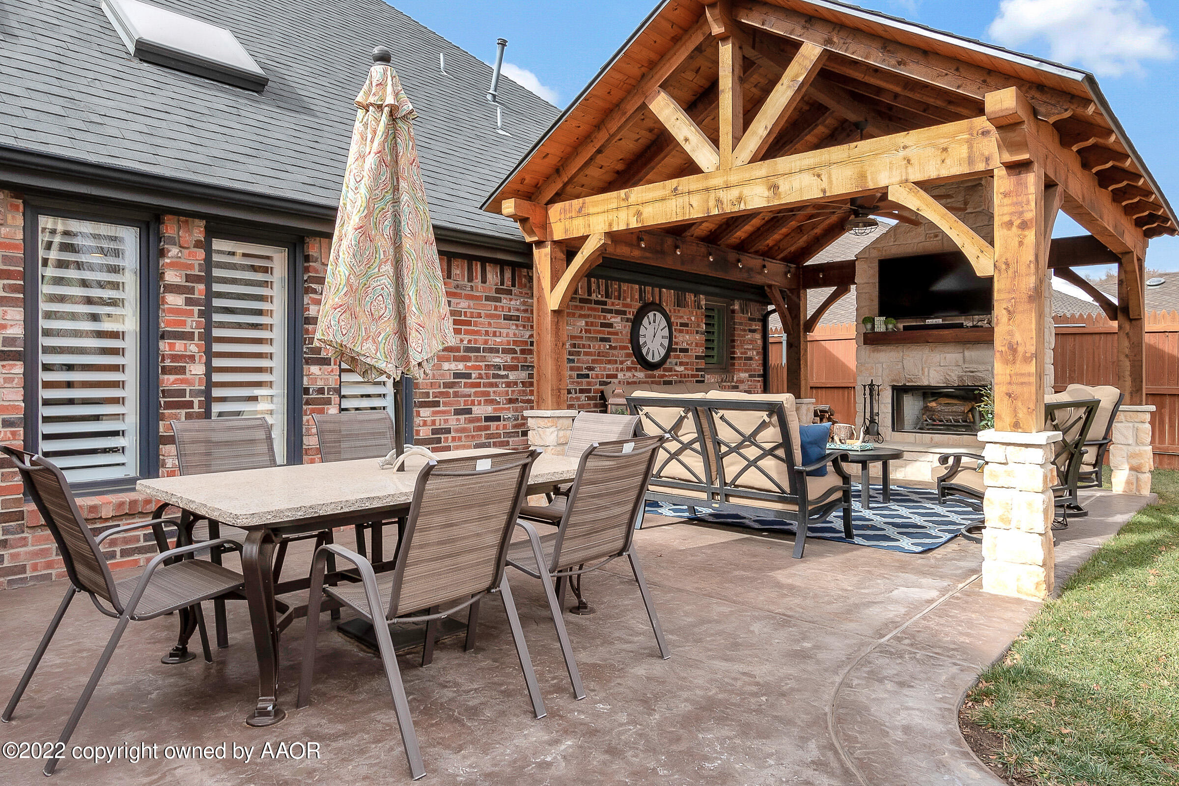 4223 Langtry Drive Amarillo, TX 79109 - Photo 45 of 56 a view of a patio with a table and chairs
