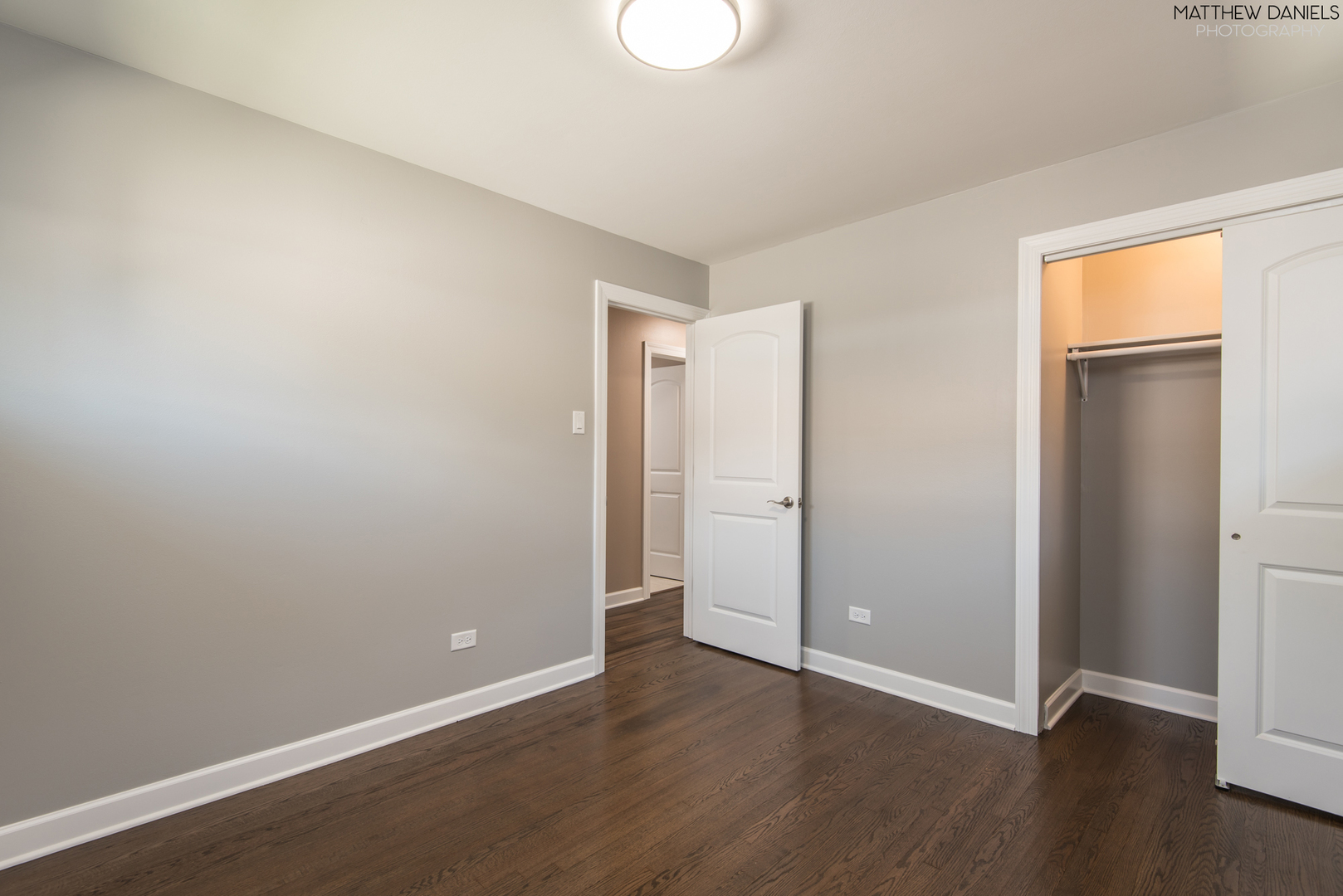 5208 State Road Burbank, IL 60459 - Photo 13 of 21 a view of an empty room with wooden floor and a window