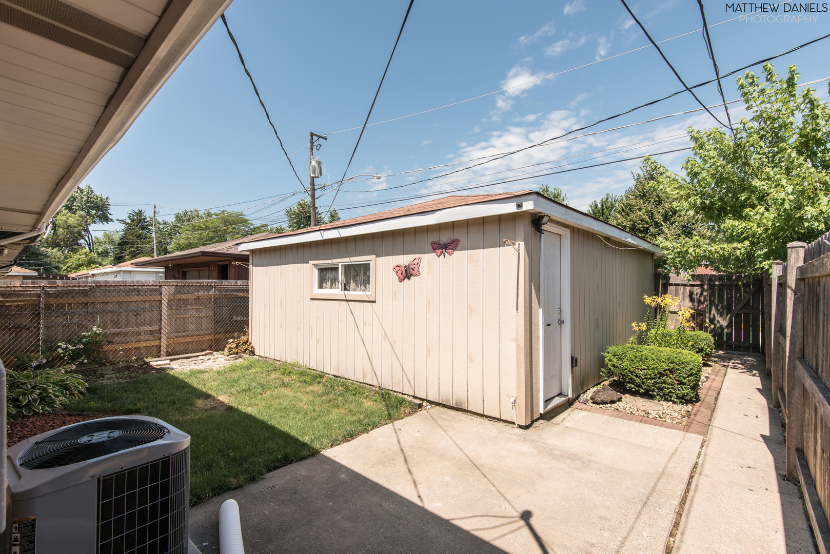 5208 State Road Burbank, IL 60459 - Photo 17 of 21 a view of a backyard with potted plants
