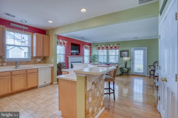 a very nice looking kitchen with a large window