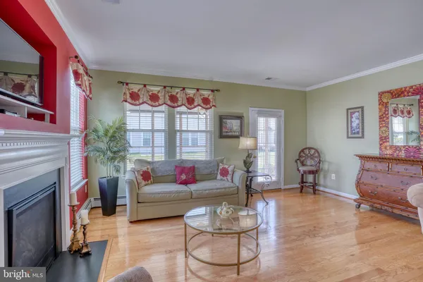 a kitchen with stainless steel appliances granite countertop a stove and a refrigerator
