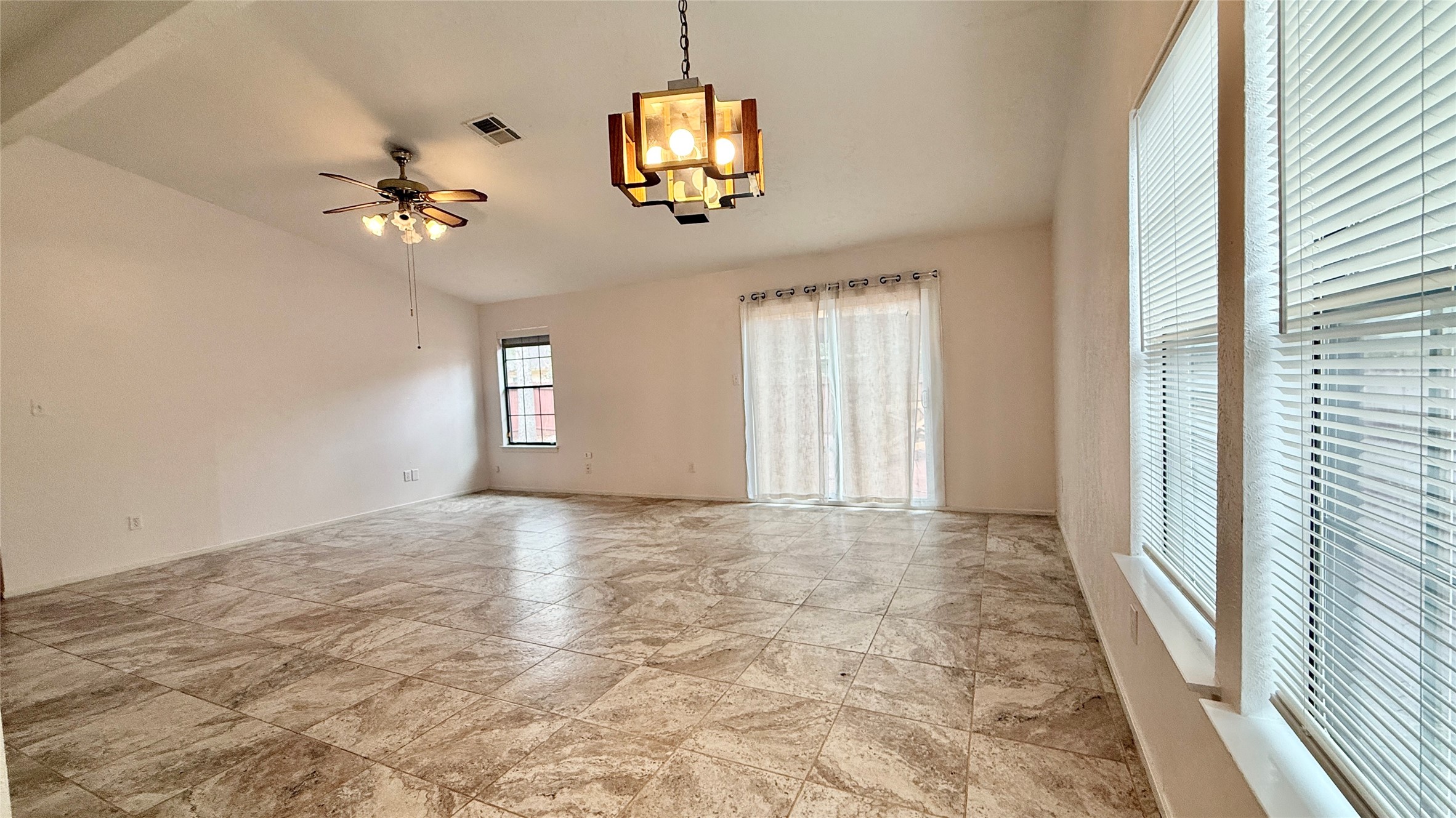 18 Dellforest Court Spring, TX 77381 - Photo 13 of 42 en view of an empty room with a window