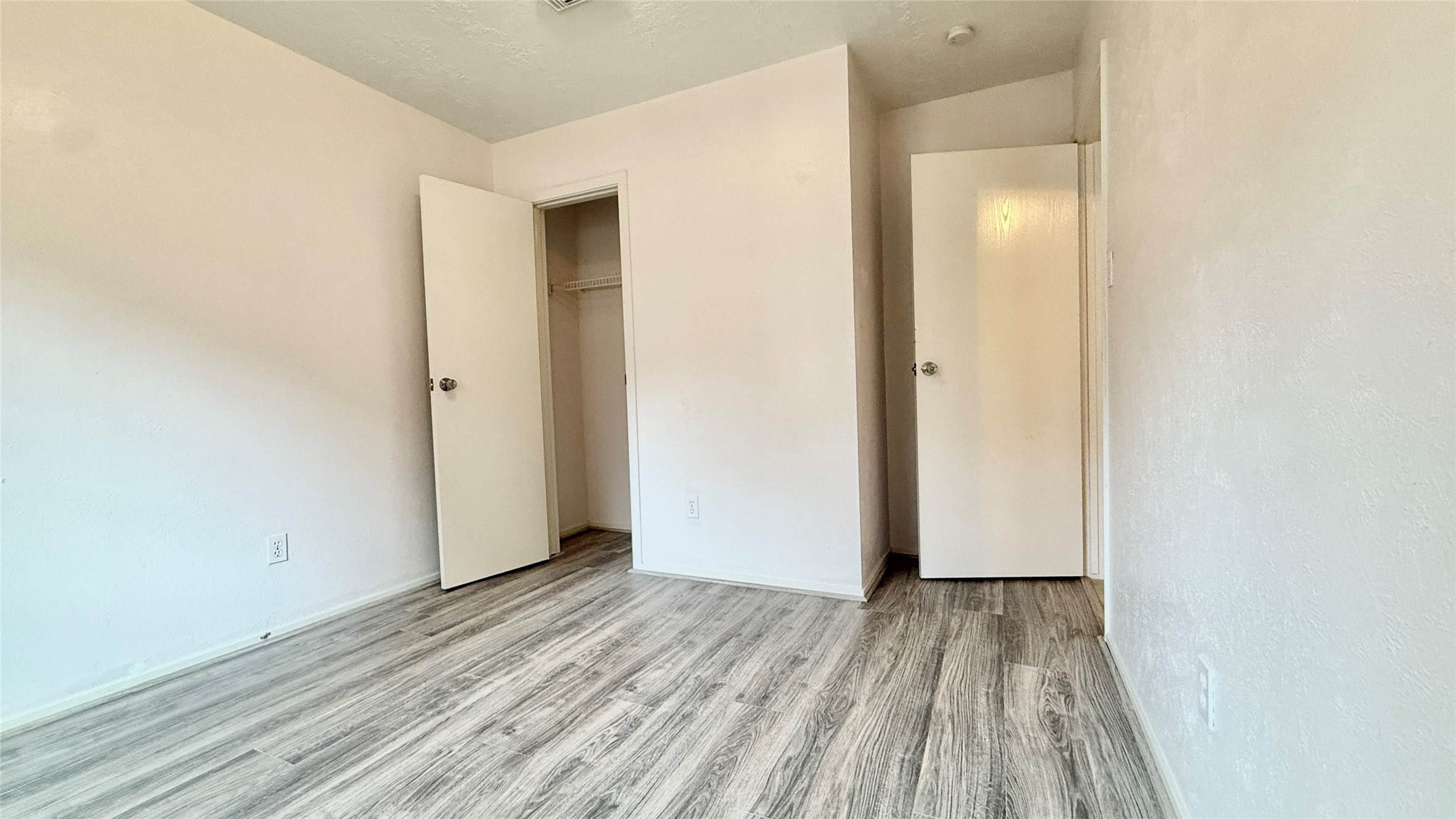 18 Dellforest Court Spring, TX 77381 - Photo 16 of 42 a view of a room with wooden floor