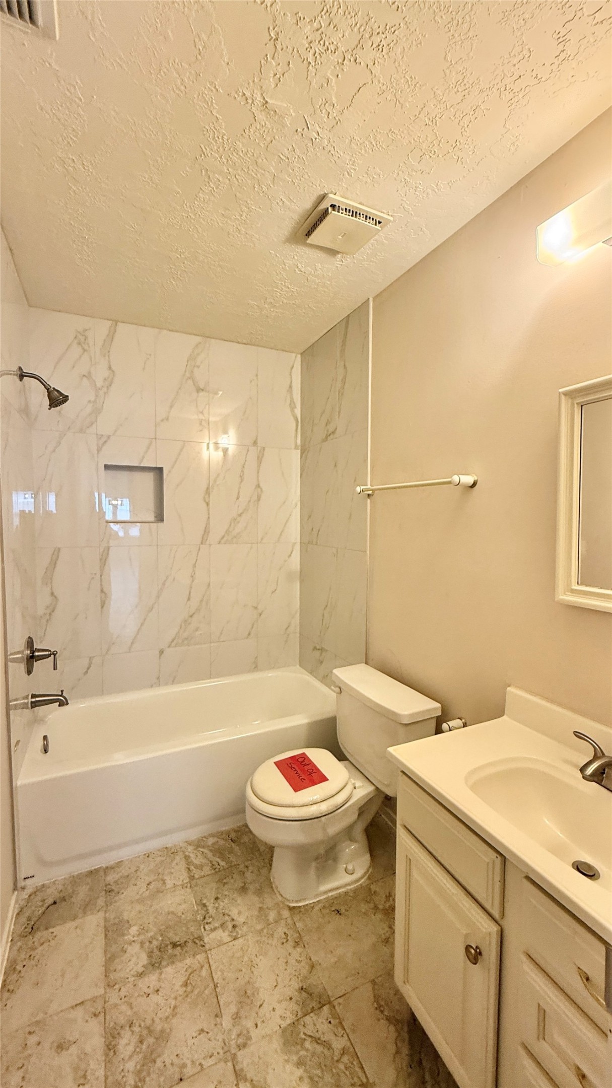 18 Dellforest Court Spring, TX 77381 - Photo 20 of 42 a bathroom with a bathtub and sink