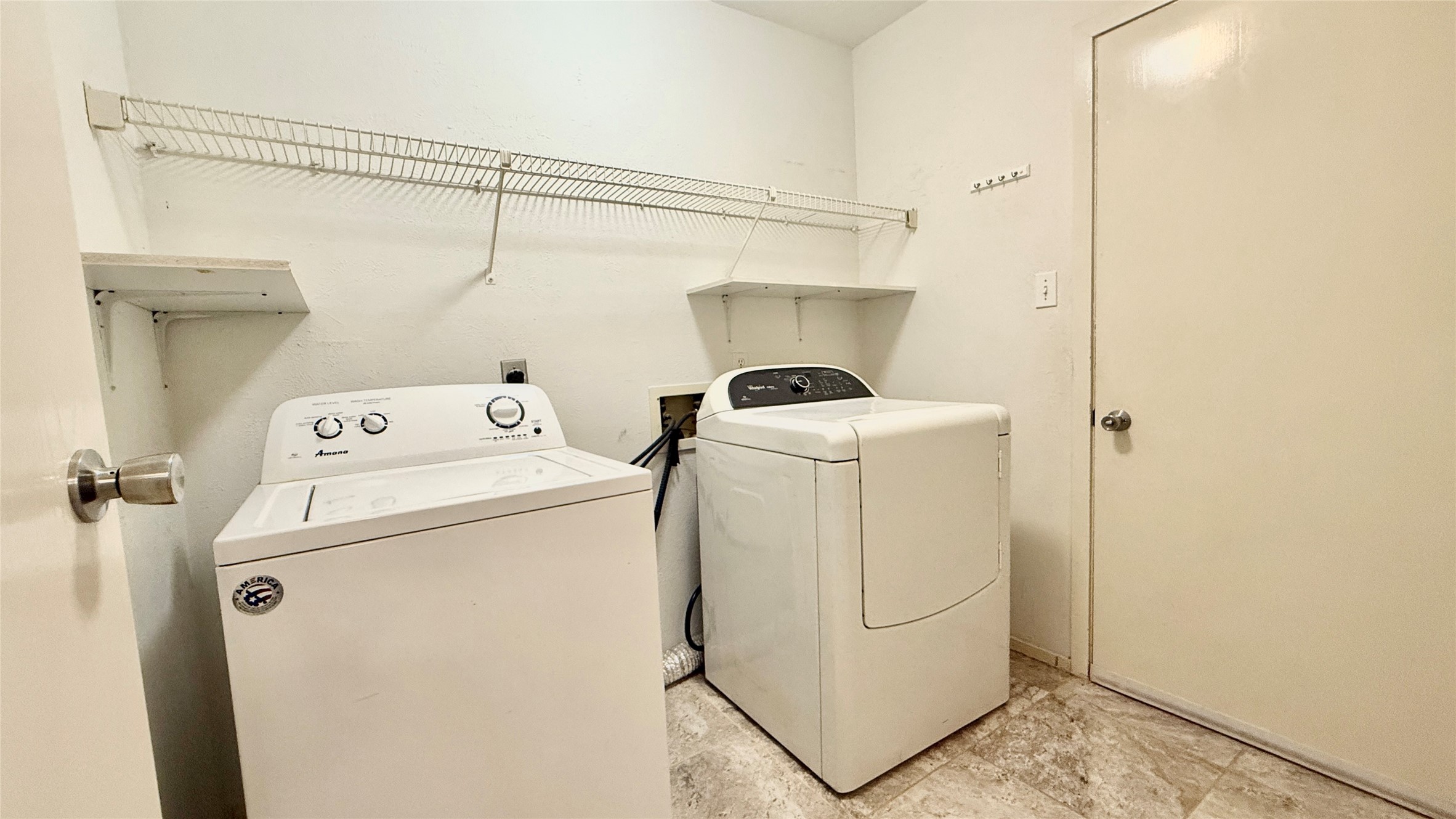 18 Dellforest Court Spring, TX 77381 - Photo 10 of 42 a utility room with dryer and washer