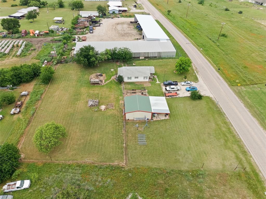 4948 Tin Top Road Weatherford, TX 76087 - Photo 24 of 24 a view of residential houses with outdoor space and lakeside