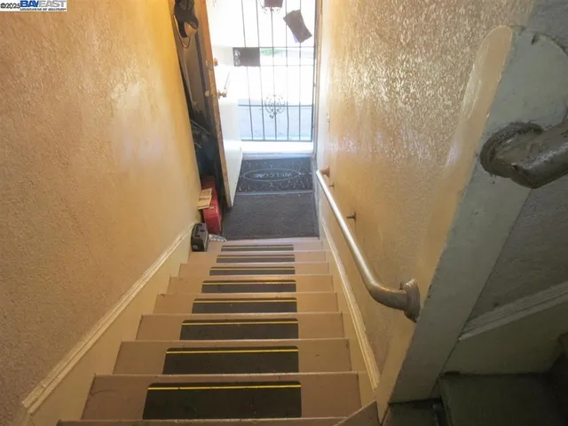 a close view of a stove top oven and cabinets