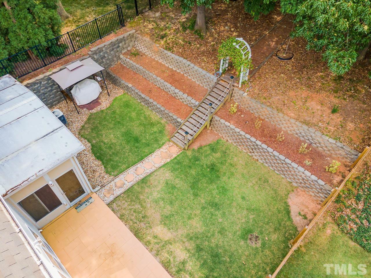 1605 October Road Raleigh, NC 27614 - Photo 4 of 31 a view of a backyard with sitting area