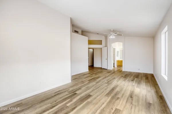 a view of an empty room and window