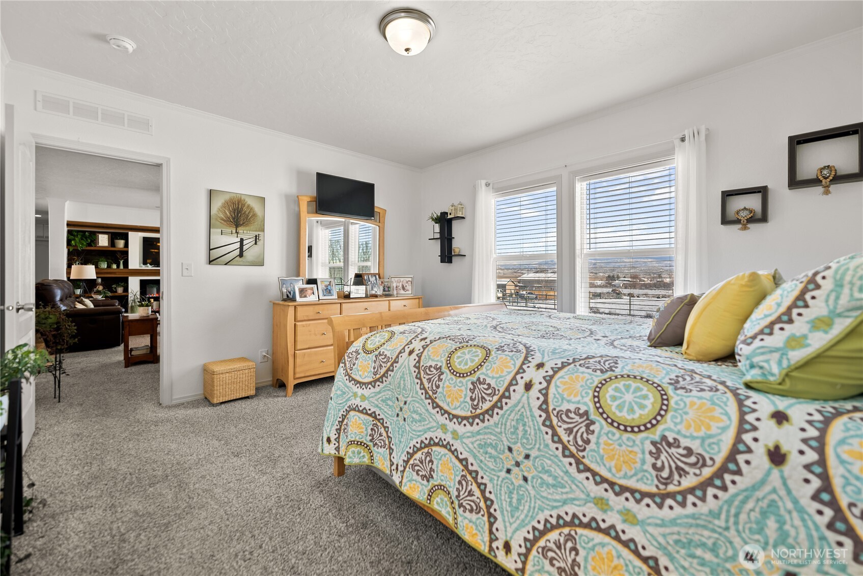 60 Alvarado Road Tonasket, WA 98855 - Photo 17 of 36 a bedroom with bed and window