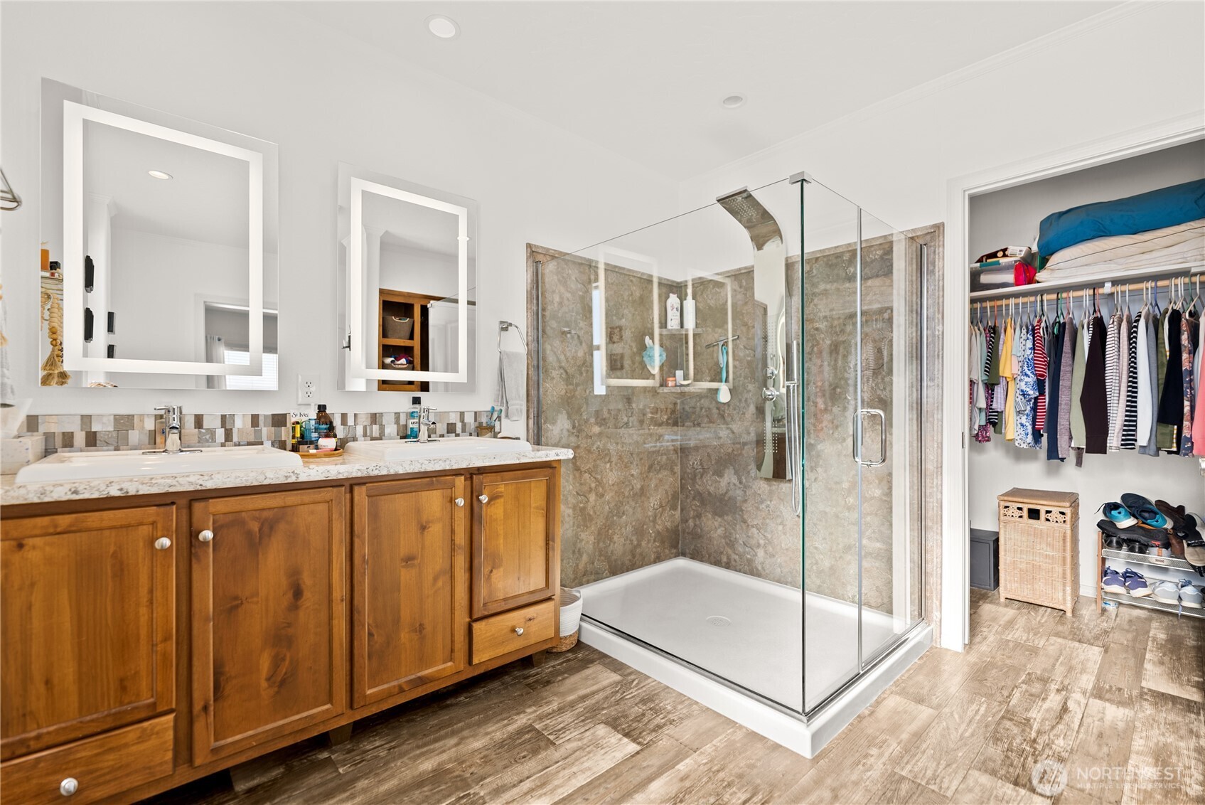60 Alvarado Road Tonasket, WA 98855 - Photo 20 of 36 a spacious bathroom with a shower sink and mirror