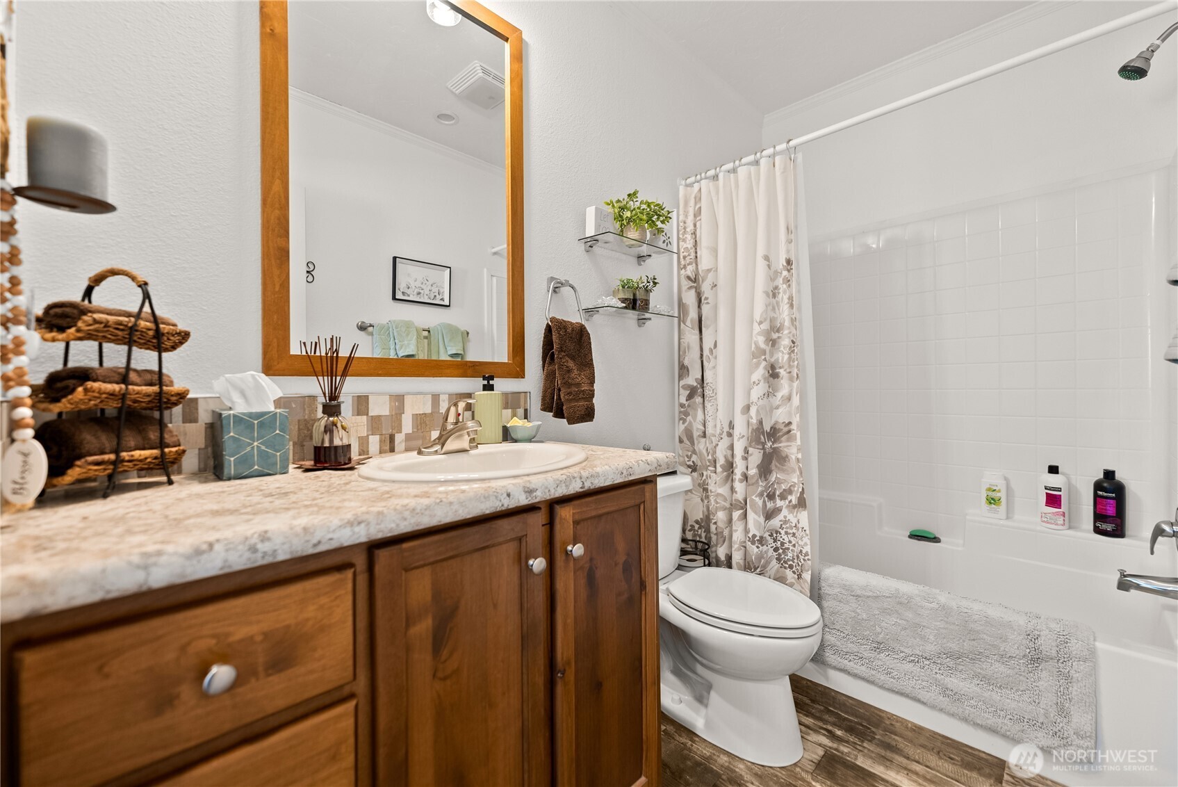 60 Alvarado Road Tonasket, WA 98855 - Photo 26 of 36 a bathroom with a granite countertop sink toilet and shower