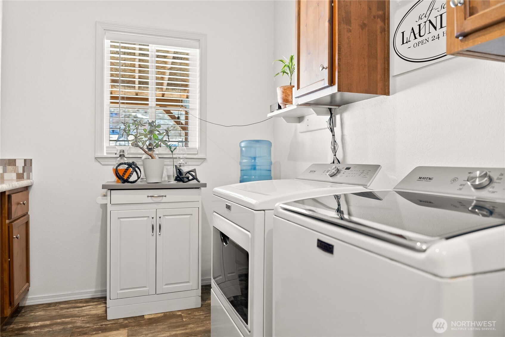60 Alvarado Road Tonasket, WA 98855 - Photo 30 of 36 a kitchen with a sink and a stove next to a window