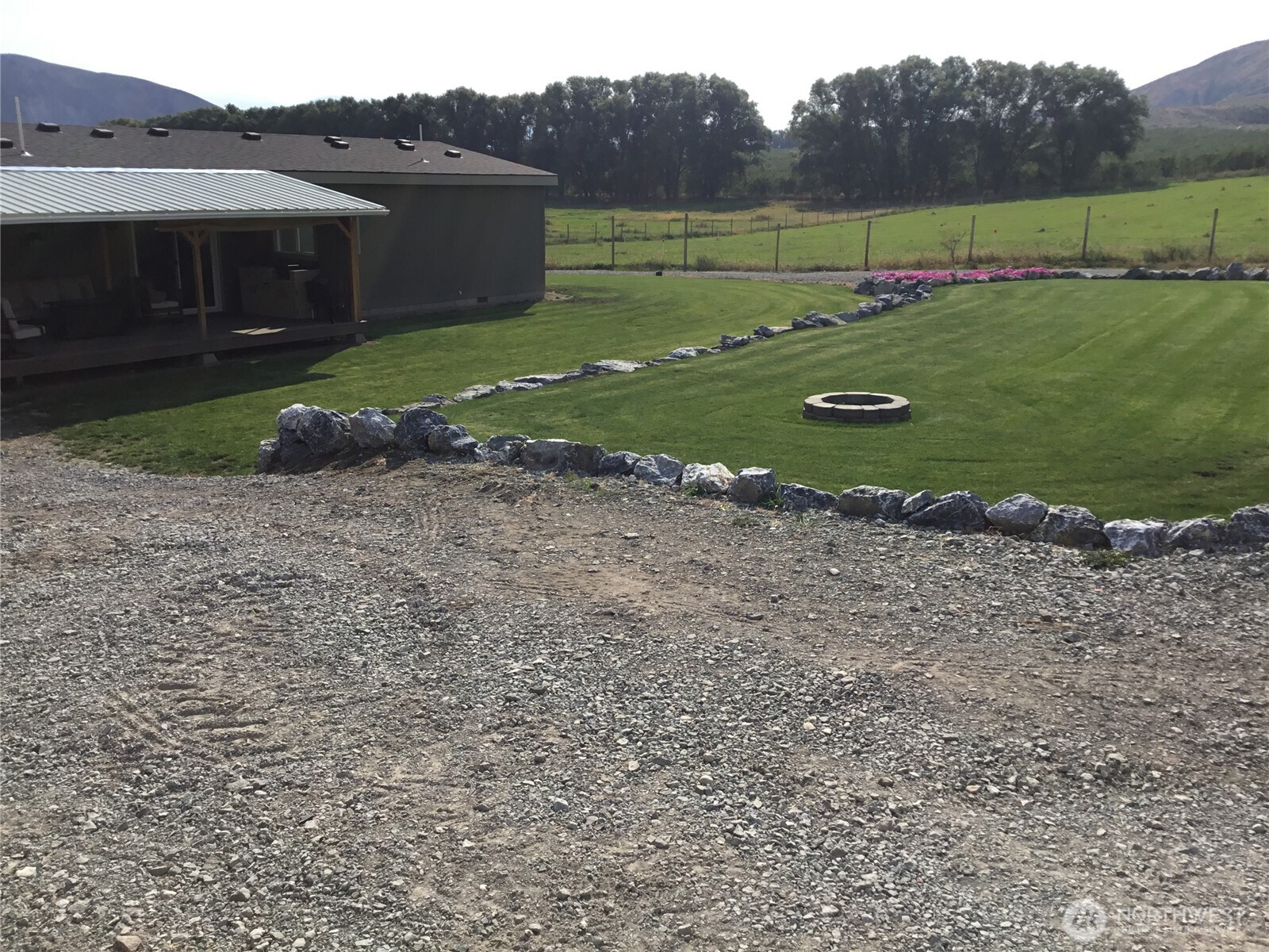 60 Alvarado Road Tonasket, WA 98855 - Photo 36 of 36 a view of outdoor space with green field