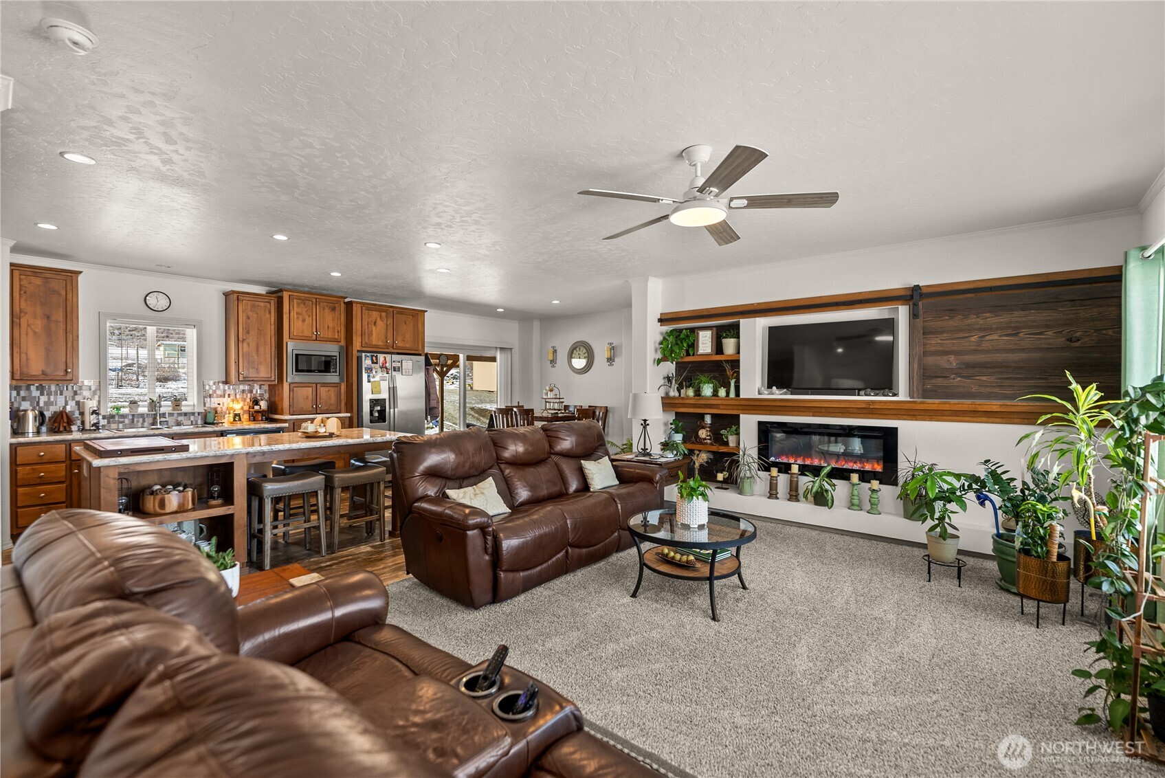 60 Alvarado Road Tonasket, WA 98855 - Photo 6 of 36 a living room with furniture kitchen view and a window