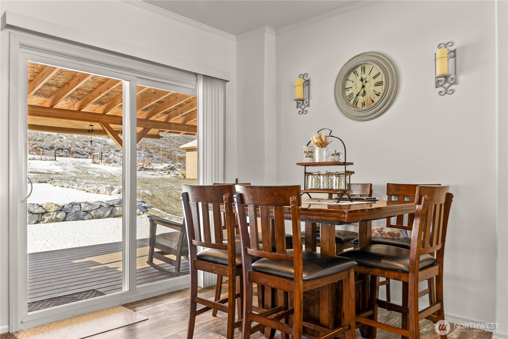 60 Alvarado Road Tonasket, WA 98855 - Photo 7 of 36 a view of a dining room with furniture window and wooden floor