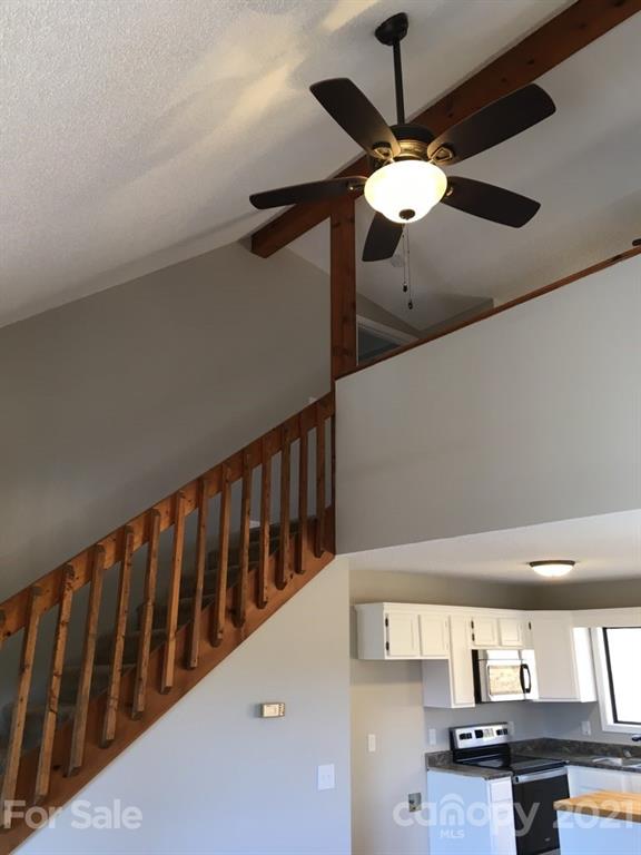 888 Rustic Heights Road Waynesville, NC 28785 - Photo 11 of 25 a view of a hallway with seating area