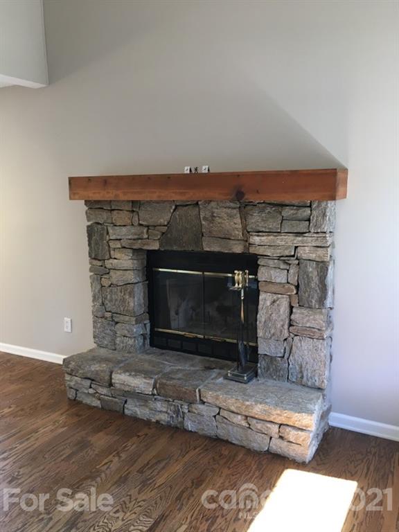 888 Rustic Heights Road Waynesville, NC 28785 - Photo 7 of 25 a room with fireplace