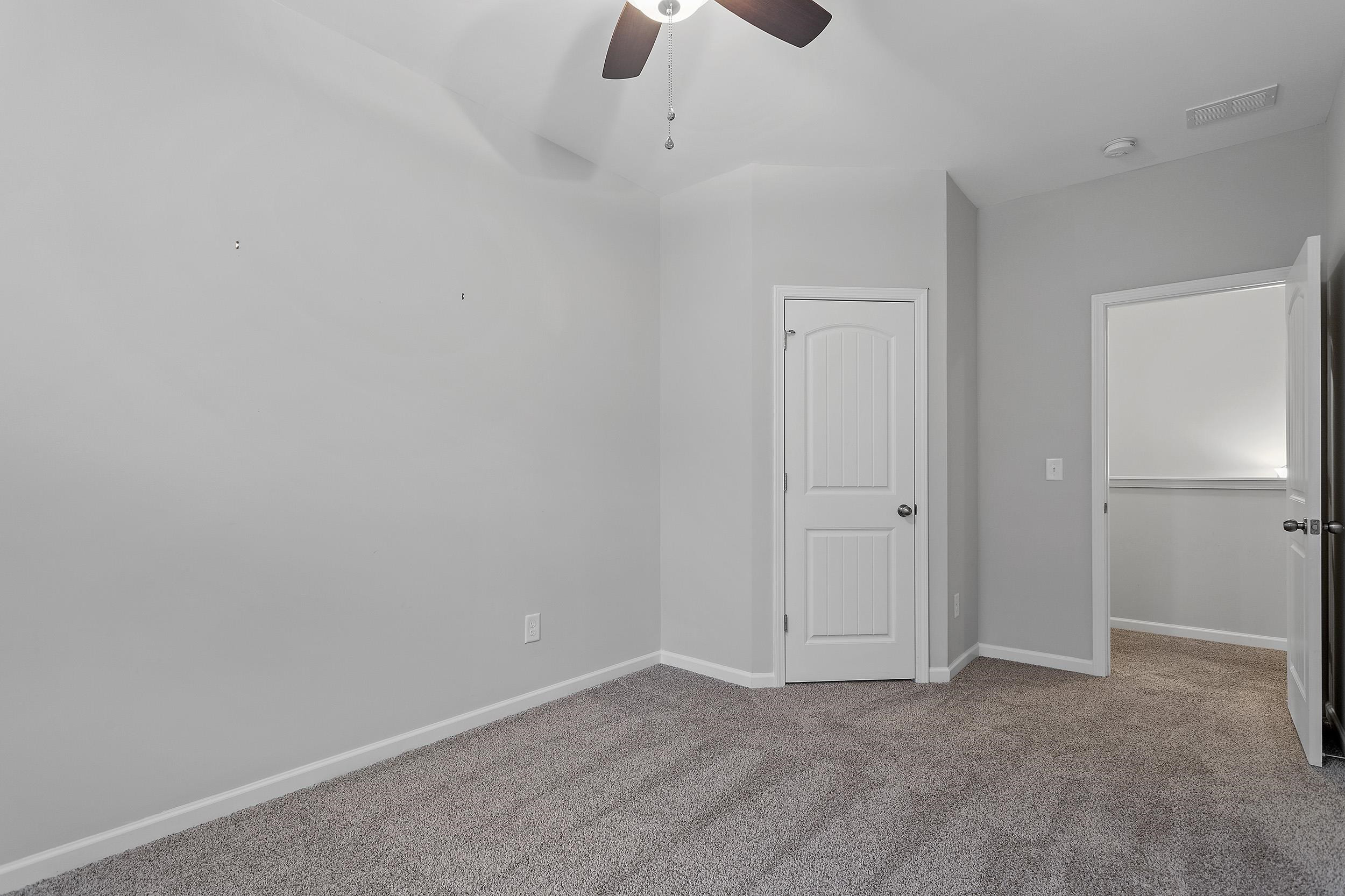 306 Springhill Lane Garner, NC 27529 - Photo 30 of 34 a view of an empty room