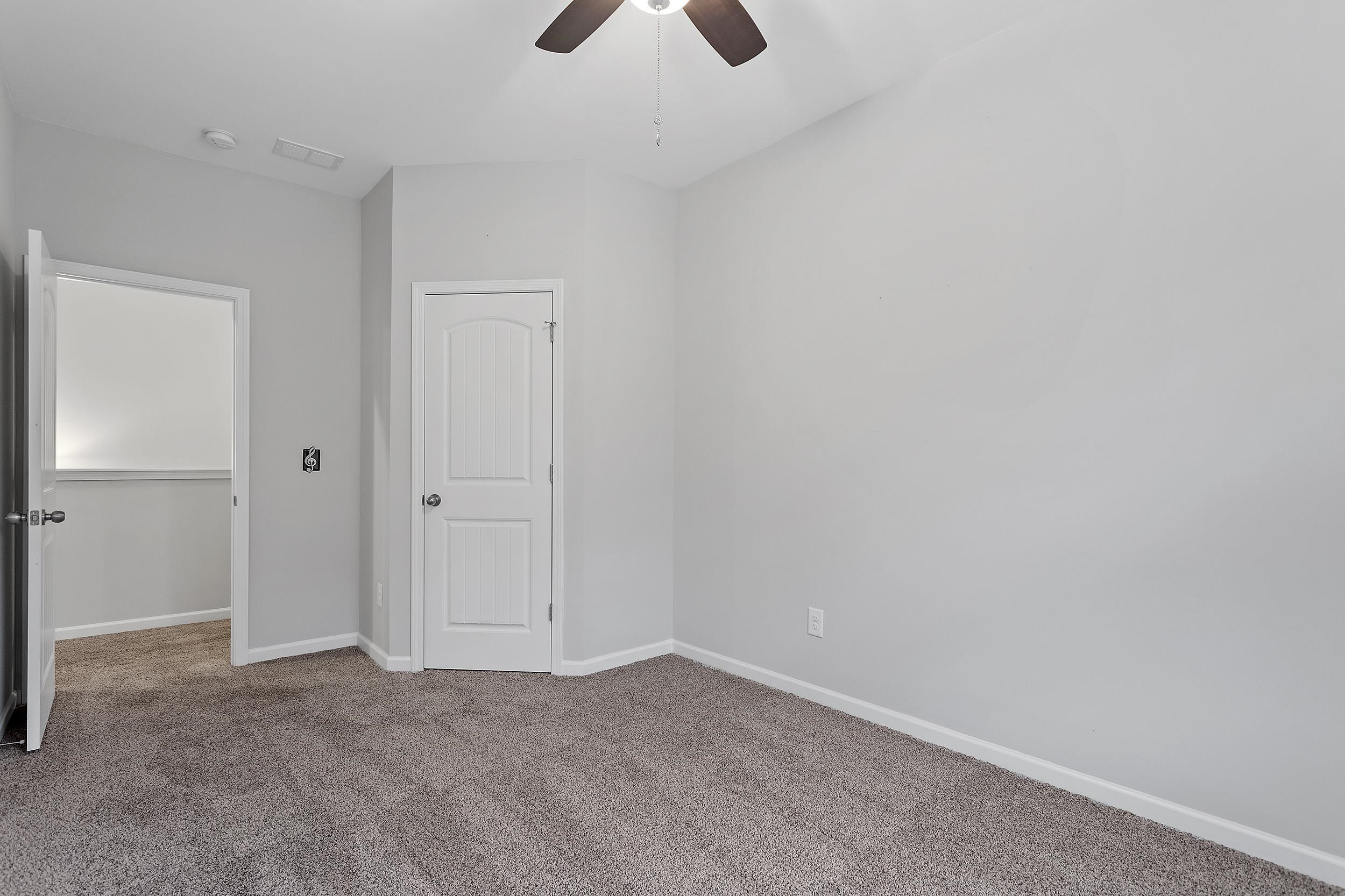 306 Springhill Lane Garner, NC 27529 - Photo 31 of 34 a view of an empty room