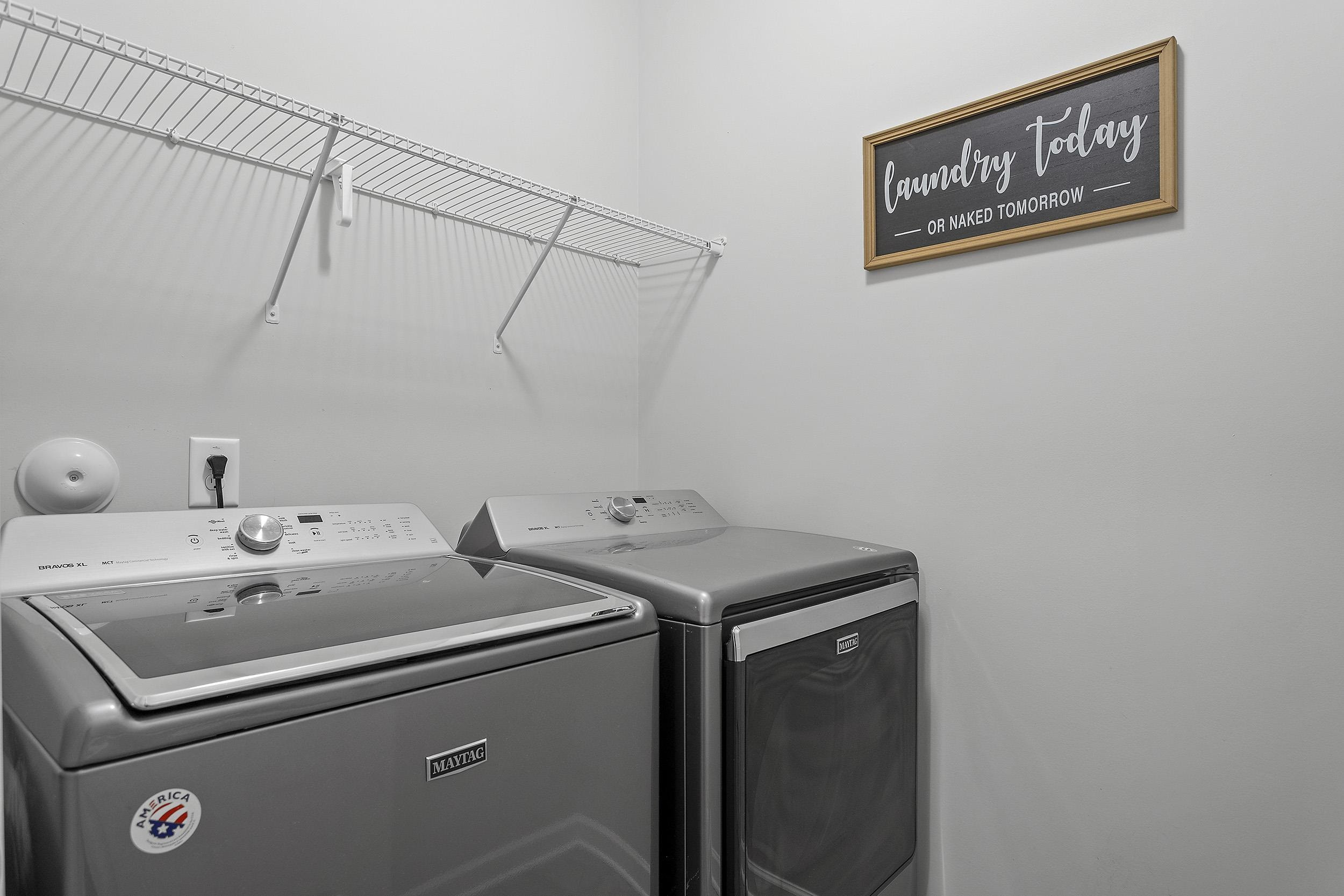306 Springhill Lane Garner, NC 27529 - Photo 32 of 34 a utility room with dryer and washer