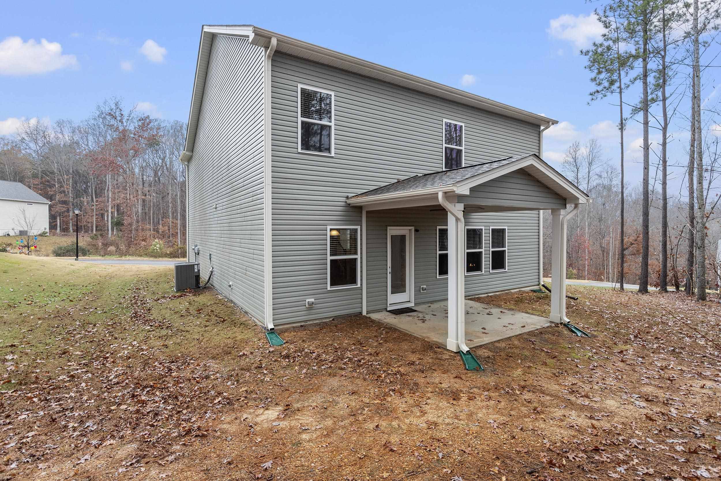 306 Springhill Lane Garner, NC 27529 - Photo 4 of 34 a view of a house with a yard
