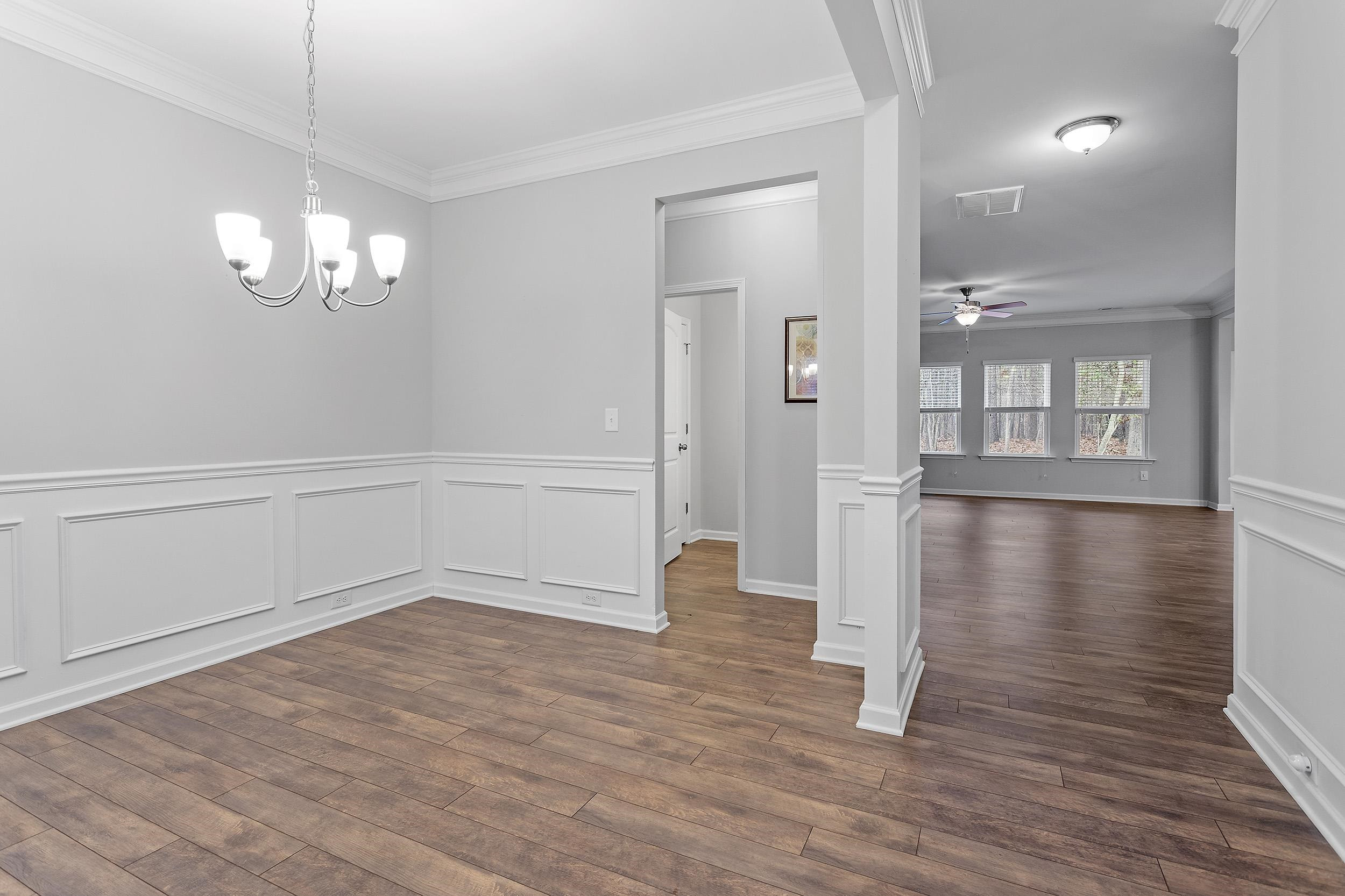 306 Springhill Lane Garner, NC 27529 - Photo 6 of 34 a view of a livingroom with wooden floor