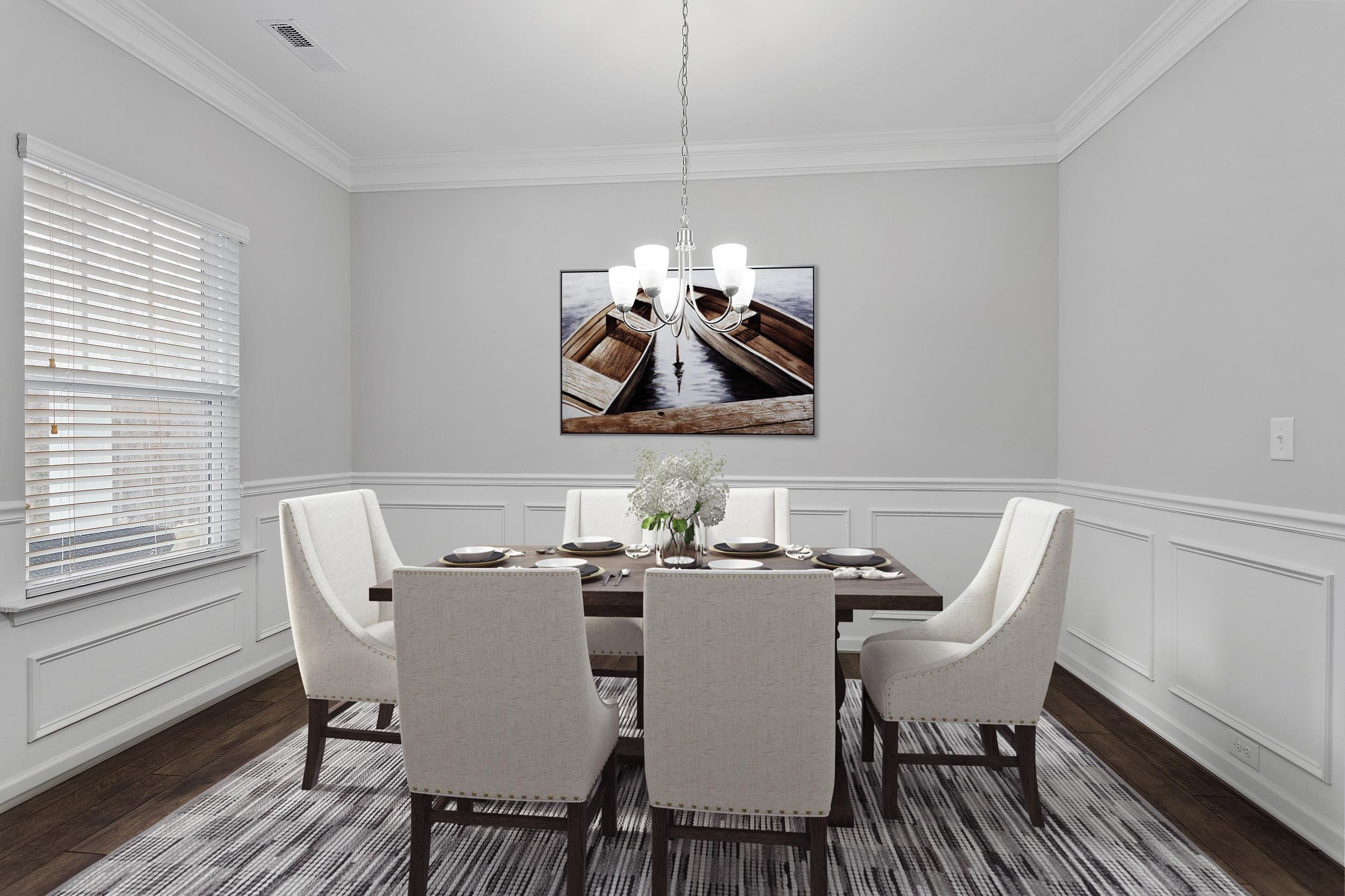 306 Springhill Lane Garner, NC 27529 - Photo 9 of 34 a view of a dining room with furniture wooden floor and a chandelier