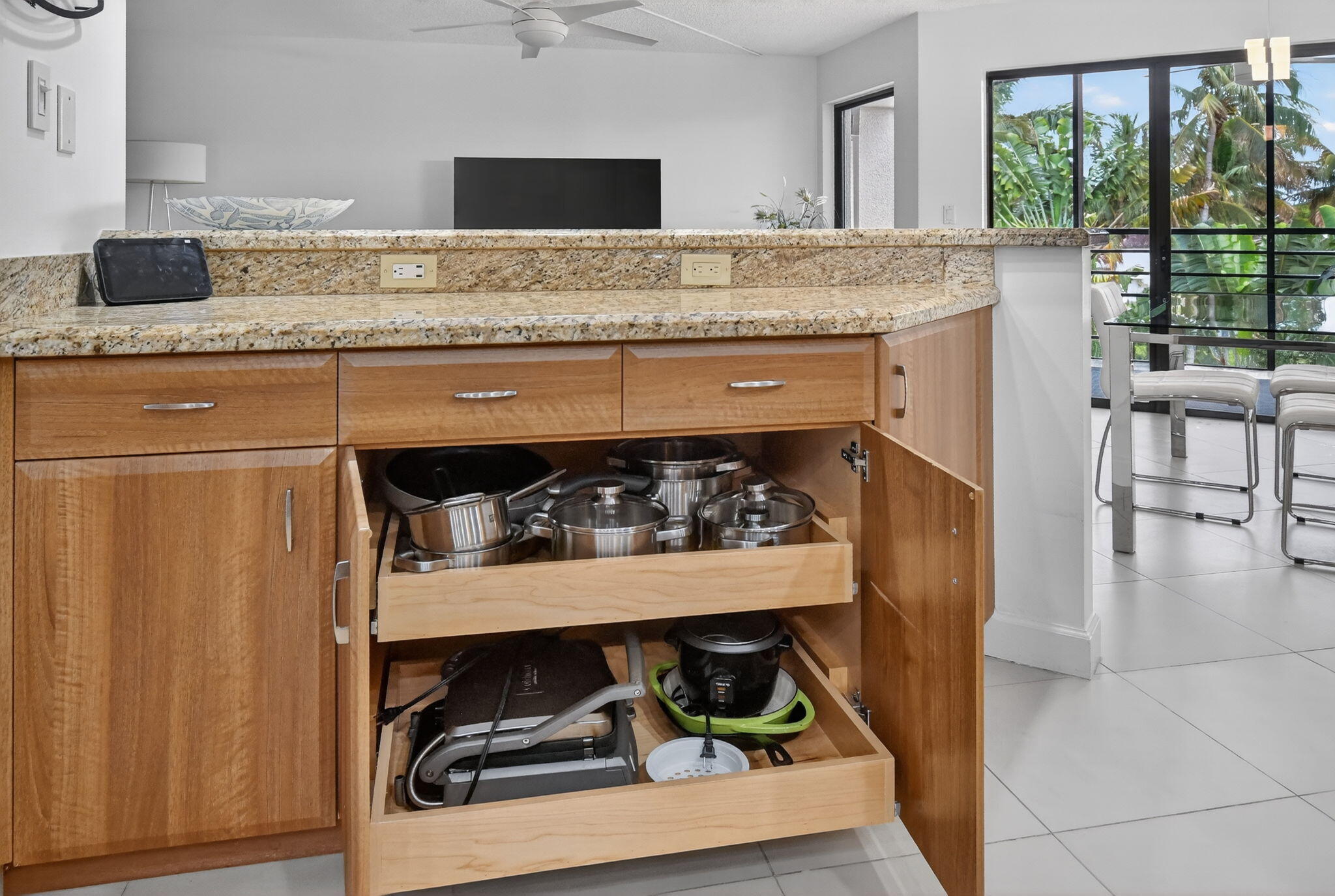5851 Camino Del Sol, Unit 402 Boca Raton, FL 33433 - Photo 16 of 40 a kitchen with a stove and cabinets